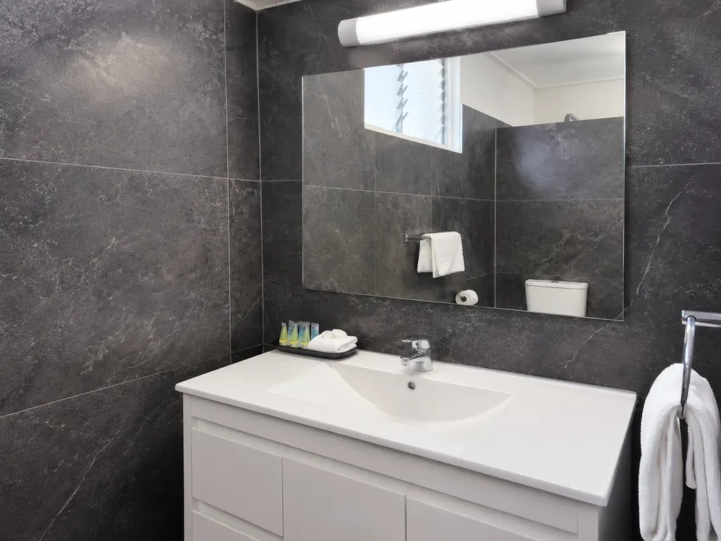 Private bathroom — vanity and mirror
