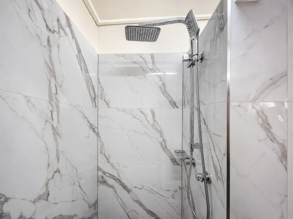 Private bathroom — showerhead detail