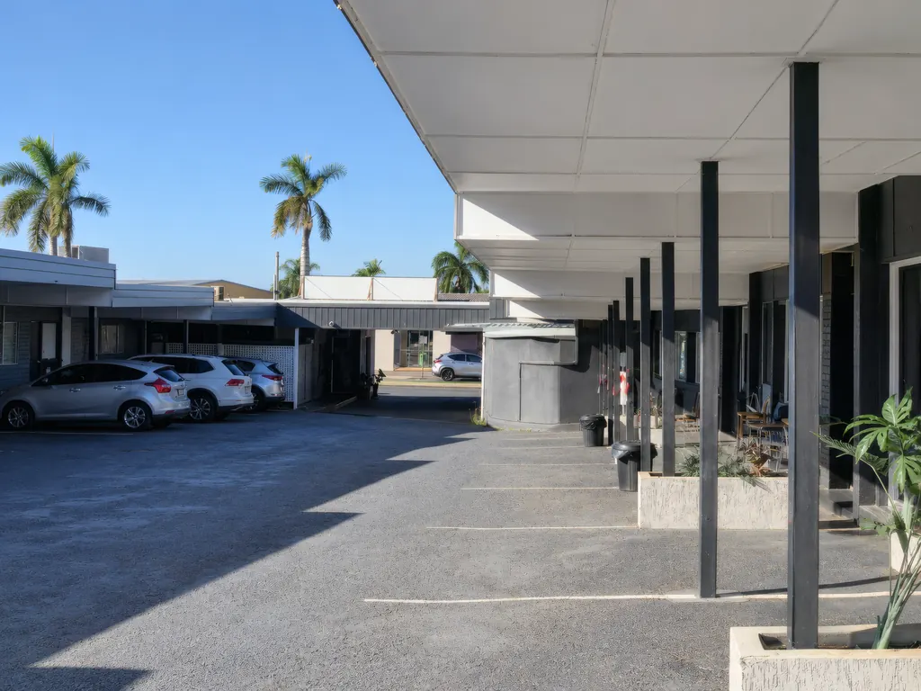 Outdoor lounge seating in the motel courtyard