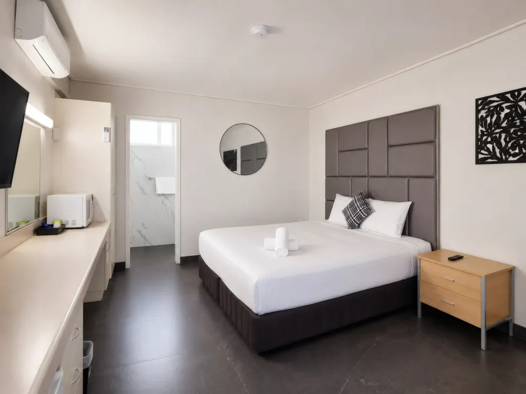 Deluxe King Room — king bed, wide view