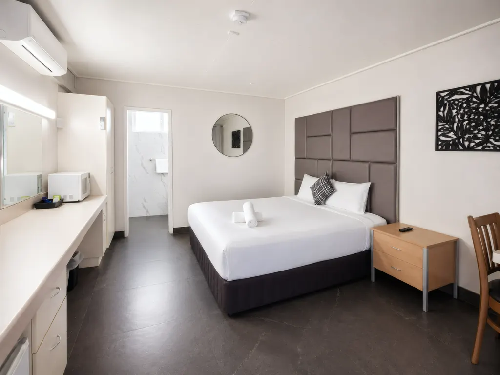 Deluxe King Room — full room, wide angle
