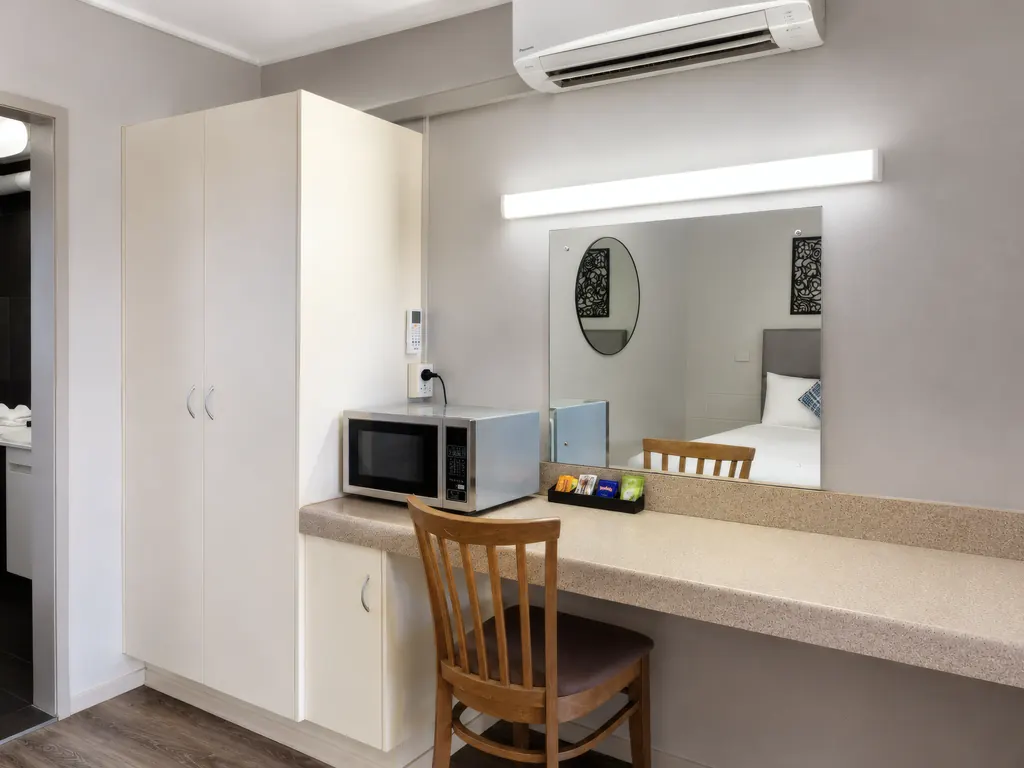 Twin Room — room view towards the desk